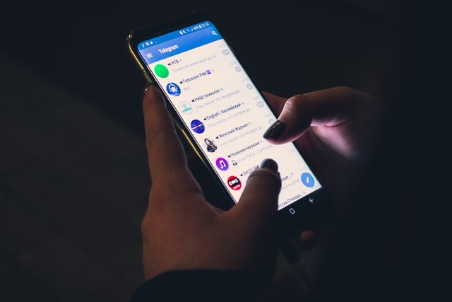 telegram app on mobile phone chatting
